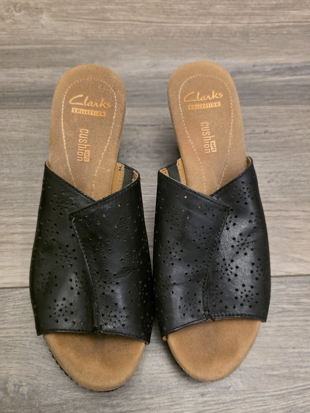 Clarks Women's Black Perforated Slip-On Sandals